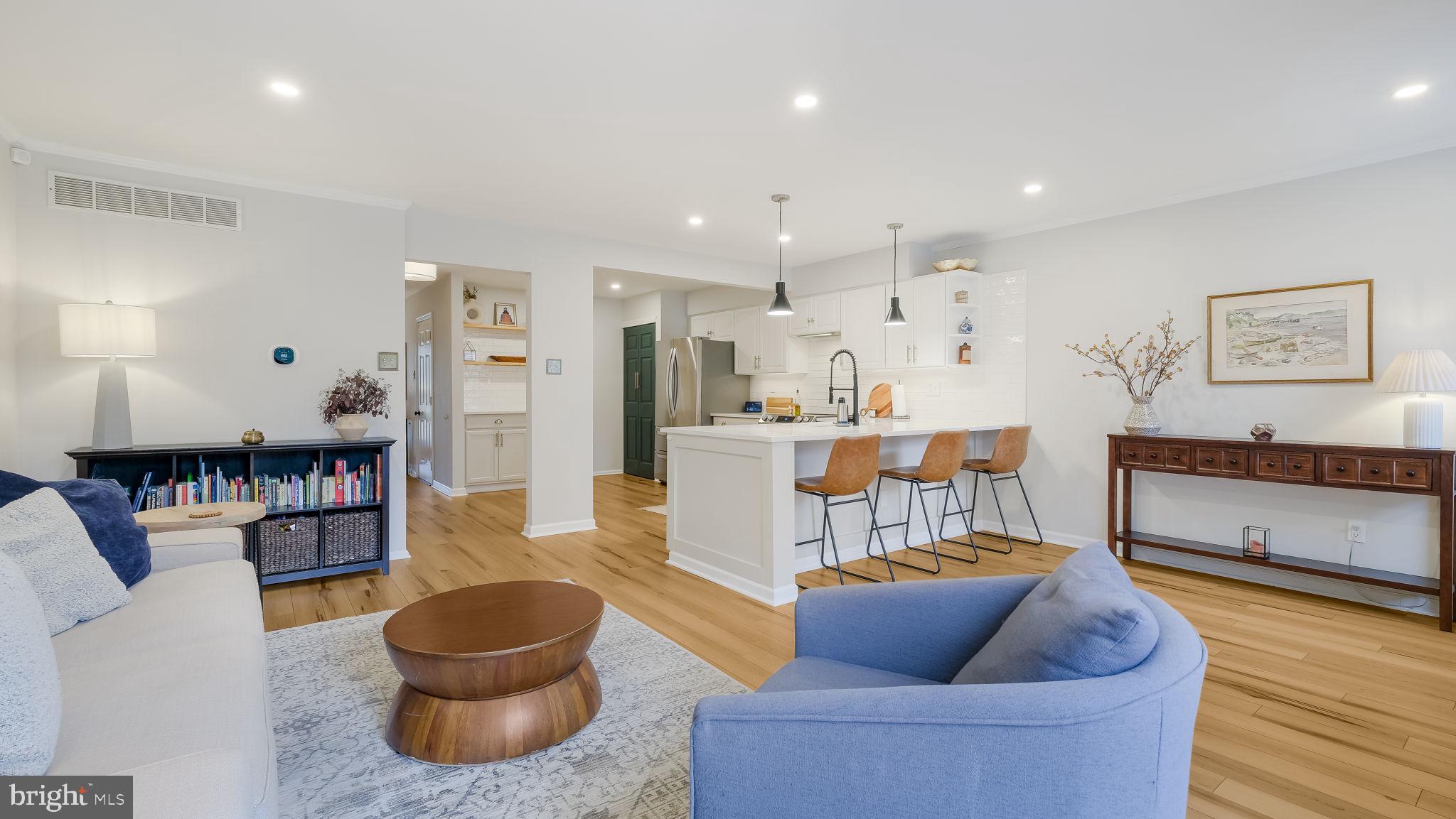 84 Trafalgar Road Doylestown, PA 18901 - Photo 20 of 50 a living room with furniture and a wooden floor