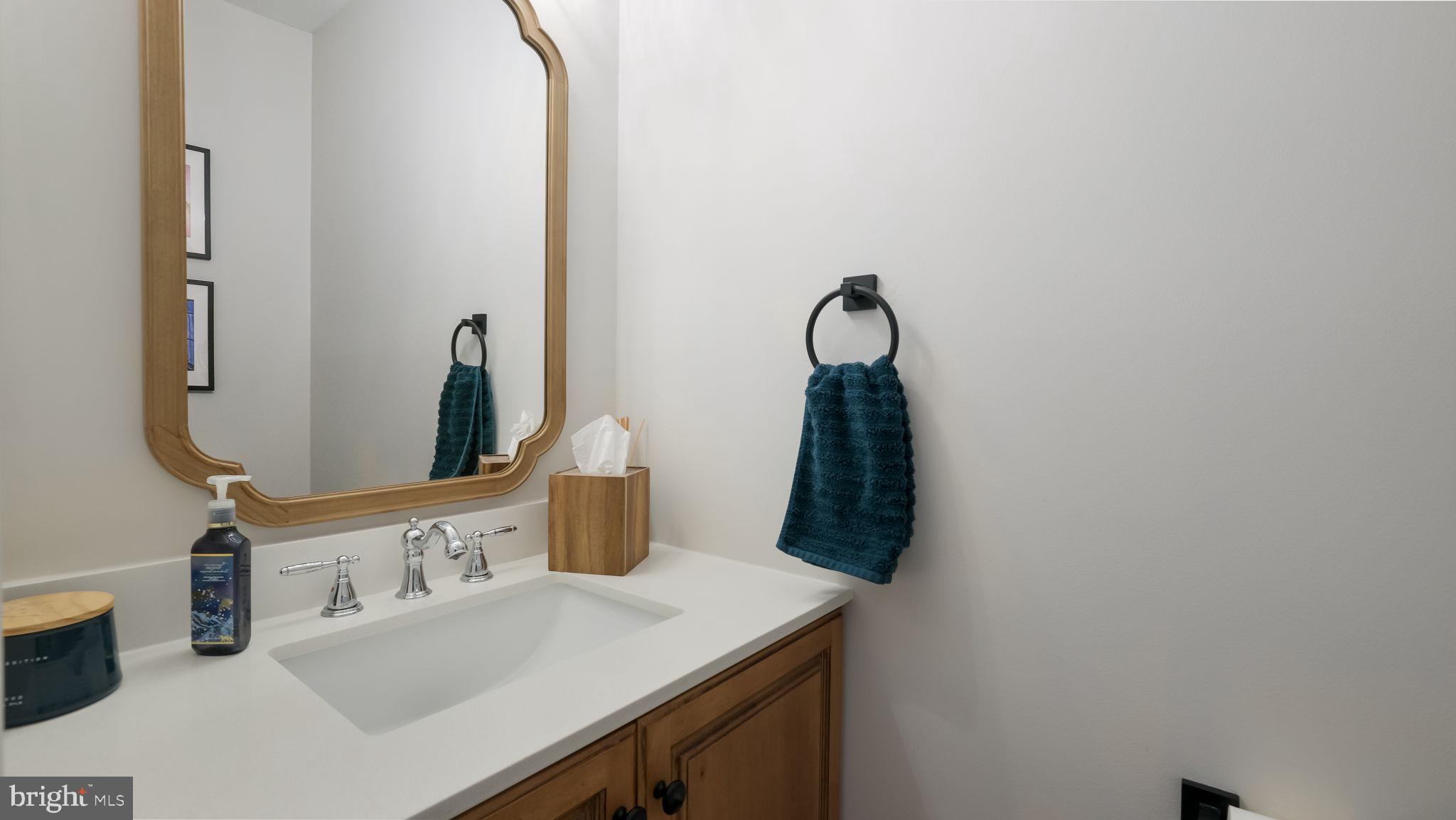 84 Trafalgar Road Doylestown, PA 18901 - Photo 22 of 50 a close view of a sink and a mirror in a bathroom
