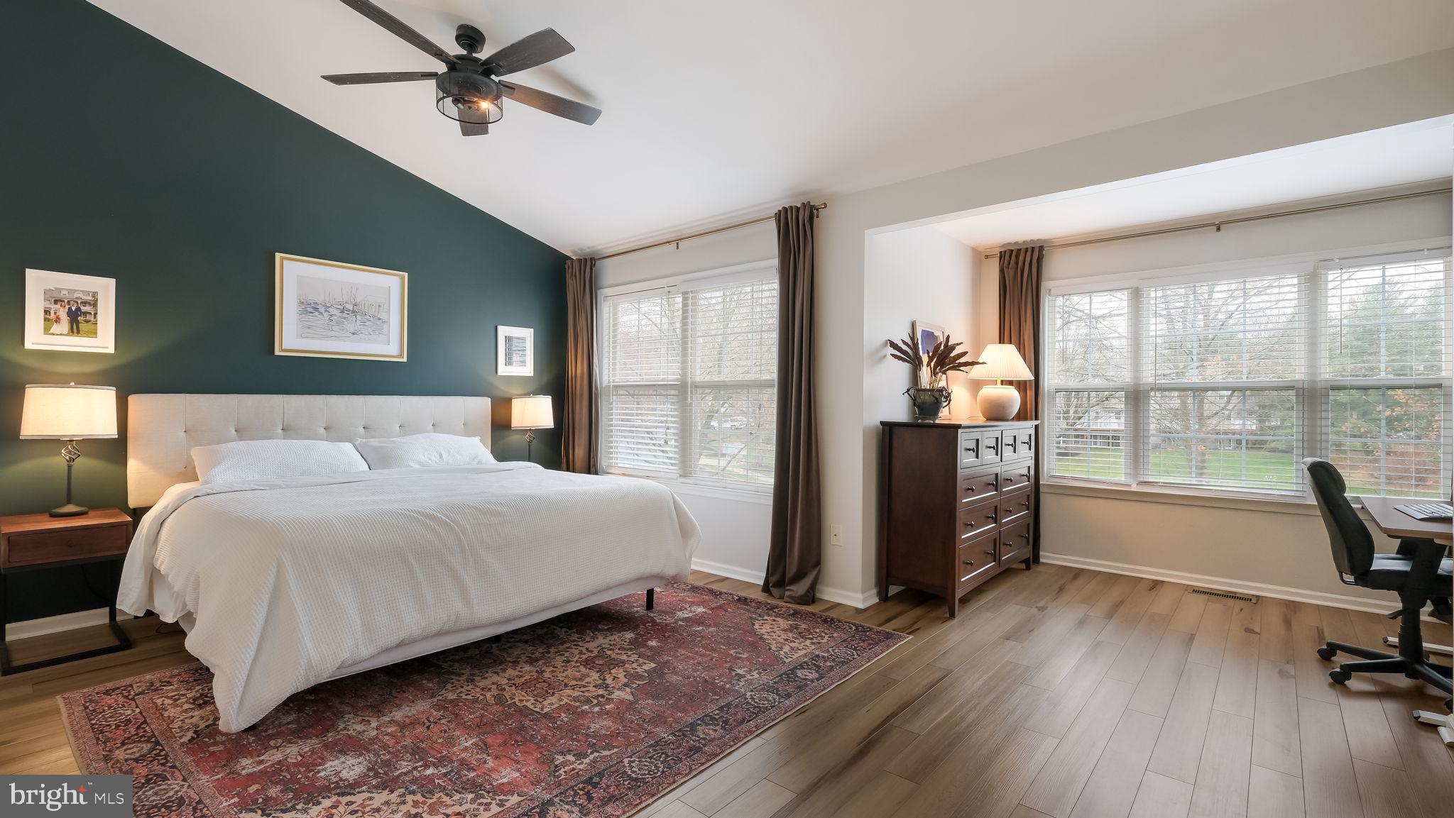 84 Trafalgar Road Doylestown, PA 18901 - Photo 26 of 50 a bedroom with a bed and wooden floor