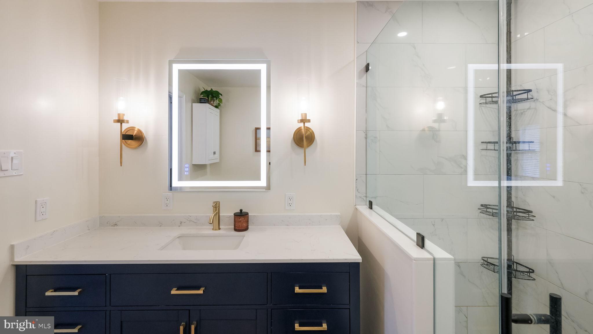 84 Trafalgar Road Doylestown, PA 18901 - Photo 32 of 50 a bathroom with a sink and a mirror