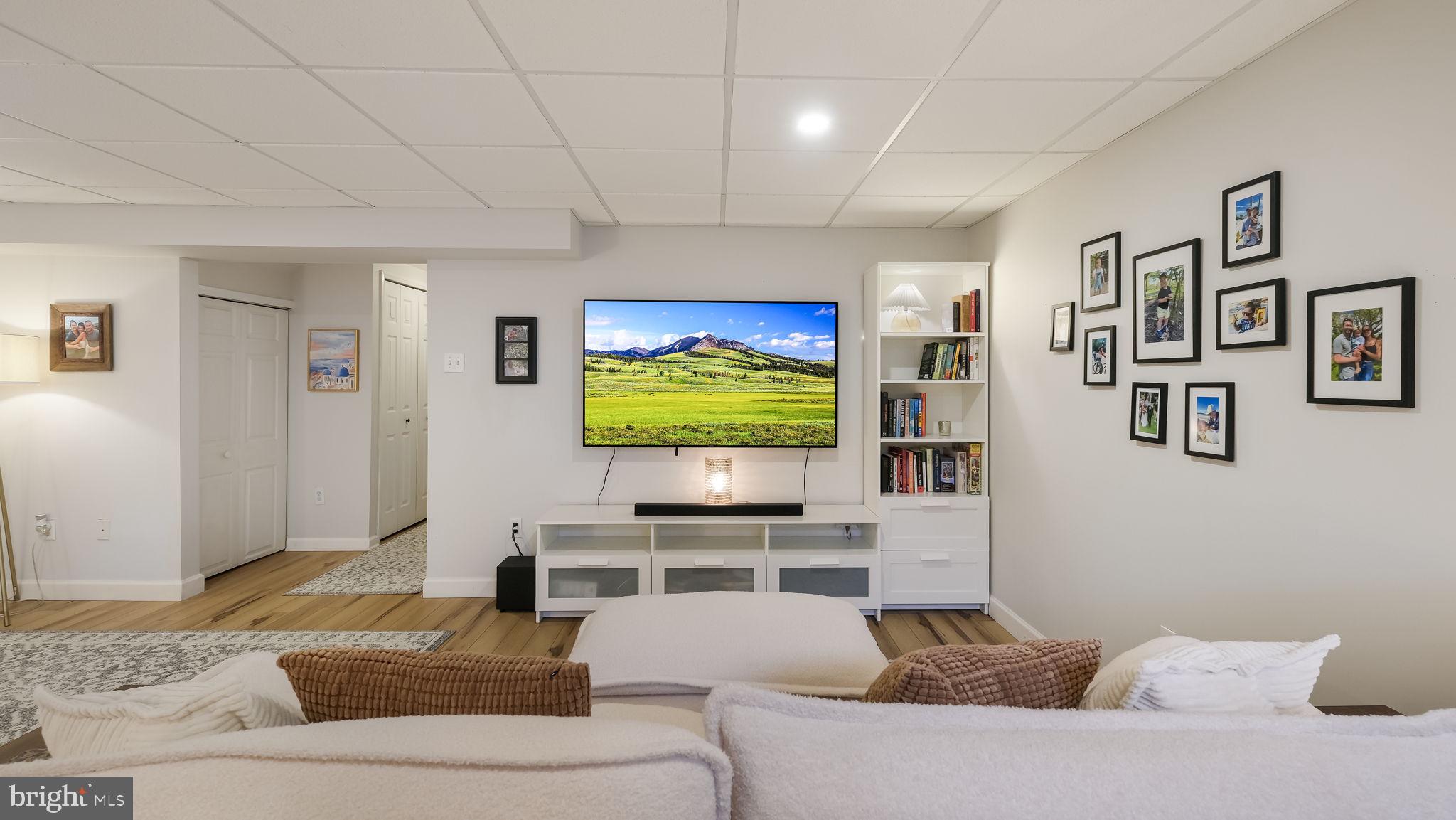 84 Trafalgar Road Doylestown, PA 18901 - Photo 40 of 50 a living room with furniture and a flat screen tv