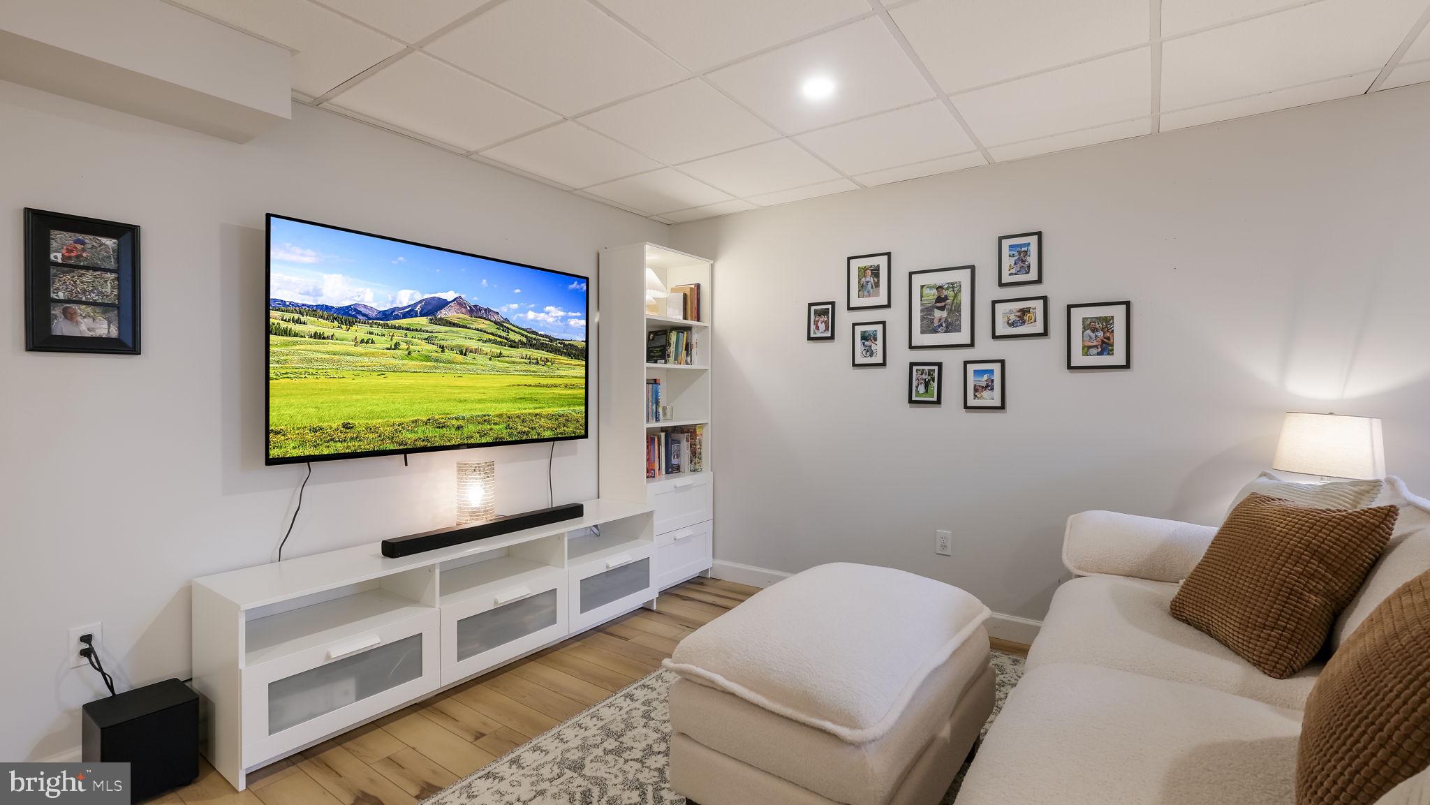 84 Trafalgar Road Doylestown, PA 18901 - Photo 41 of 50 a living room with furniture and a flat screen tv