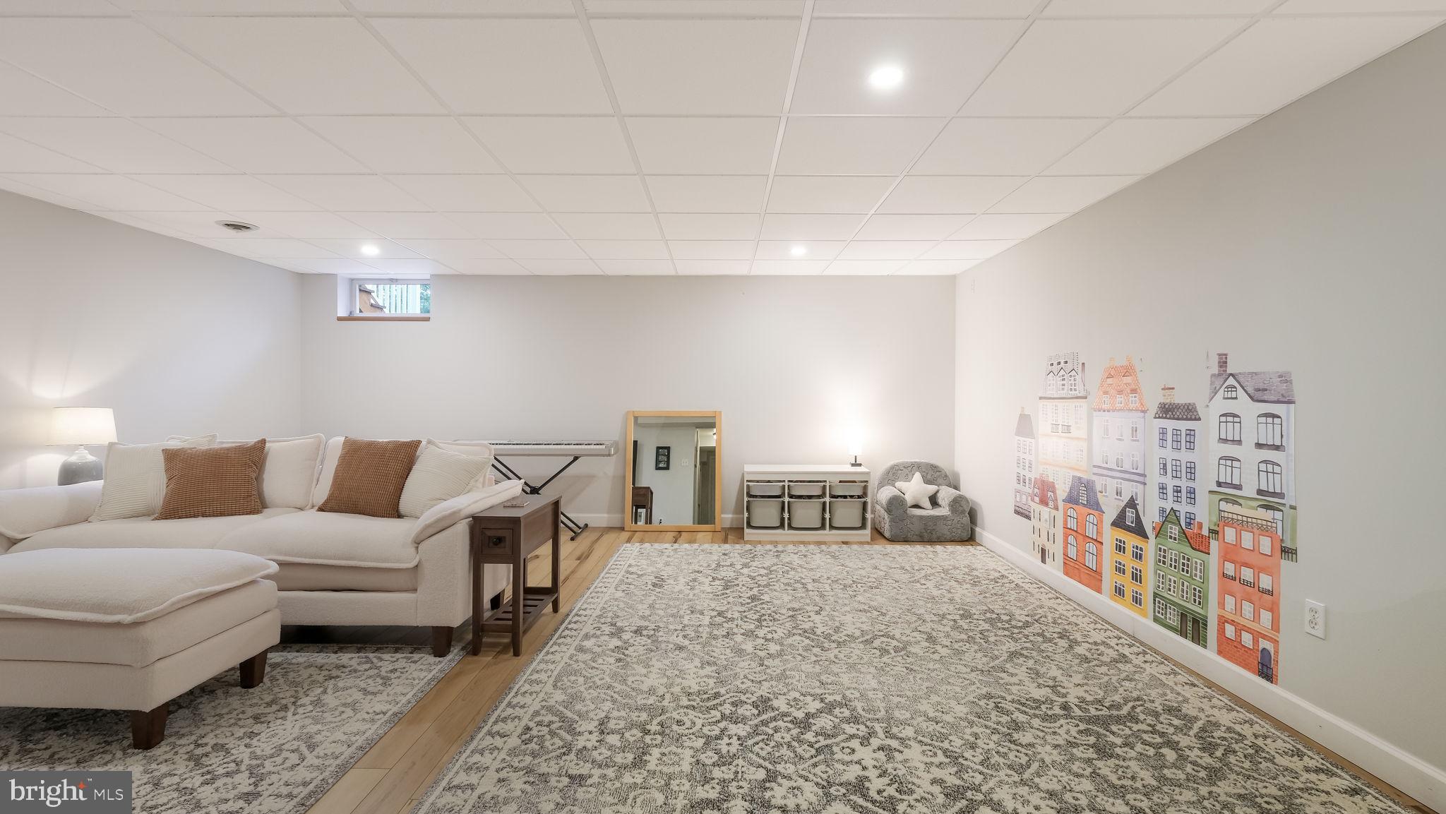 84 Trafalgar Road Doylestown, PA 18901 - Photo 43 of 50 a living room with furniture a couch and large window