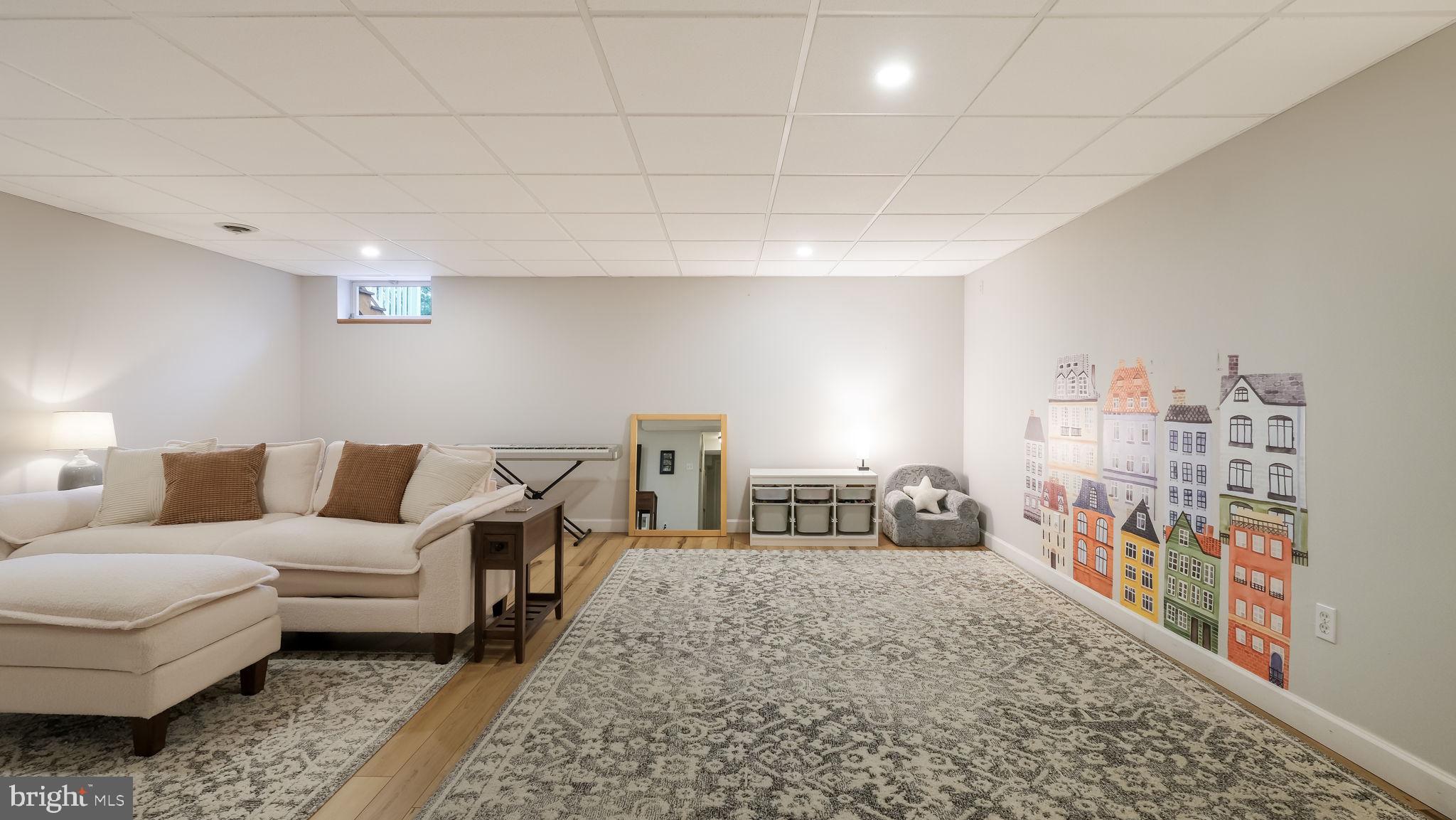 84 Trafalgar Road Doylestown, PA 18901 - Photo 44 of 50 a living room with furniture and a table