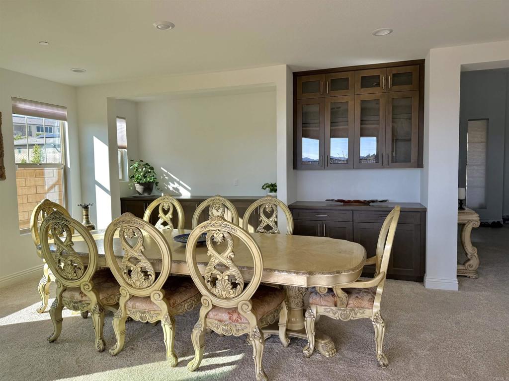 39529 Dayspring Way Temecula, CA 92591 - Photo 14 of 49 a view of a dining room with furniture