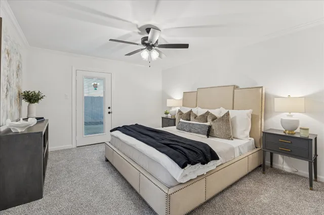 a bedroom with bed and window