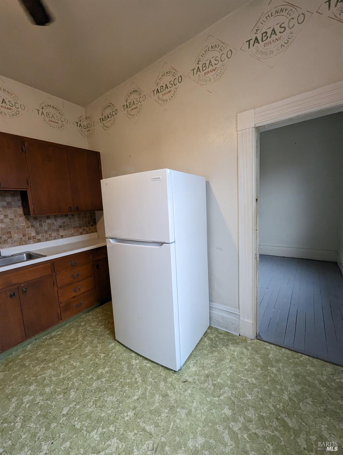 1547 4th Street, Unit A San Rafael, CA 94901 - Photo 51 of 64 a view of kitchen with refrigerator and microwave