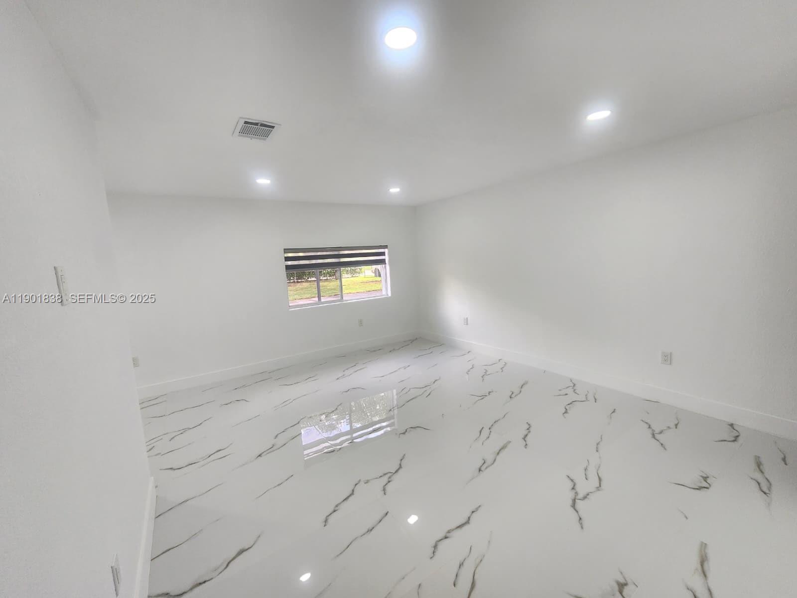 19621 Southwest 308th Street Homestead, FL 33030 - Photo 18 of 31 a view of an empty room