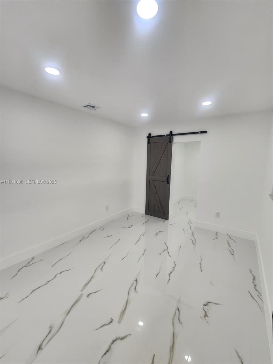 19621 Southwest 308th Street Homestead, FL 33030 - Photo 22 of 31 a view of an empty room