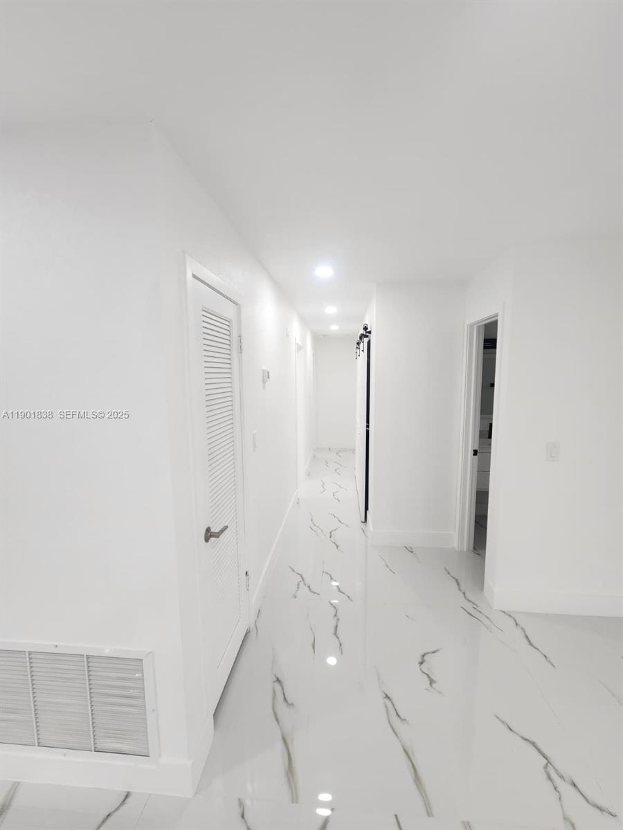 19621 Southwest 308th Street Homestead, FL 33030 - Photo 23 of 31 a view of an empty room