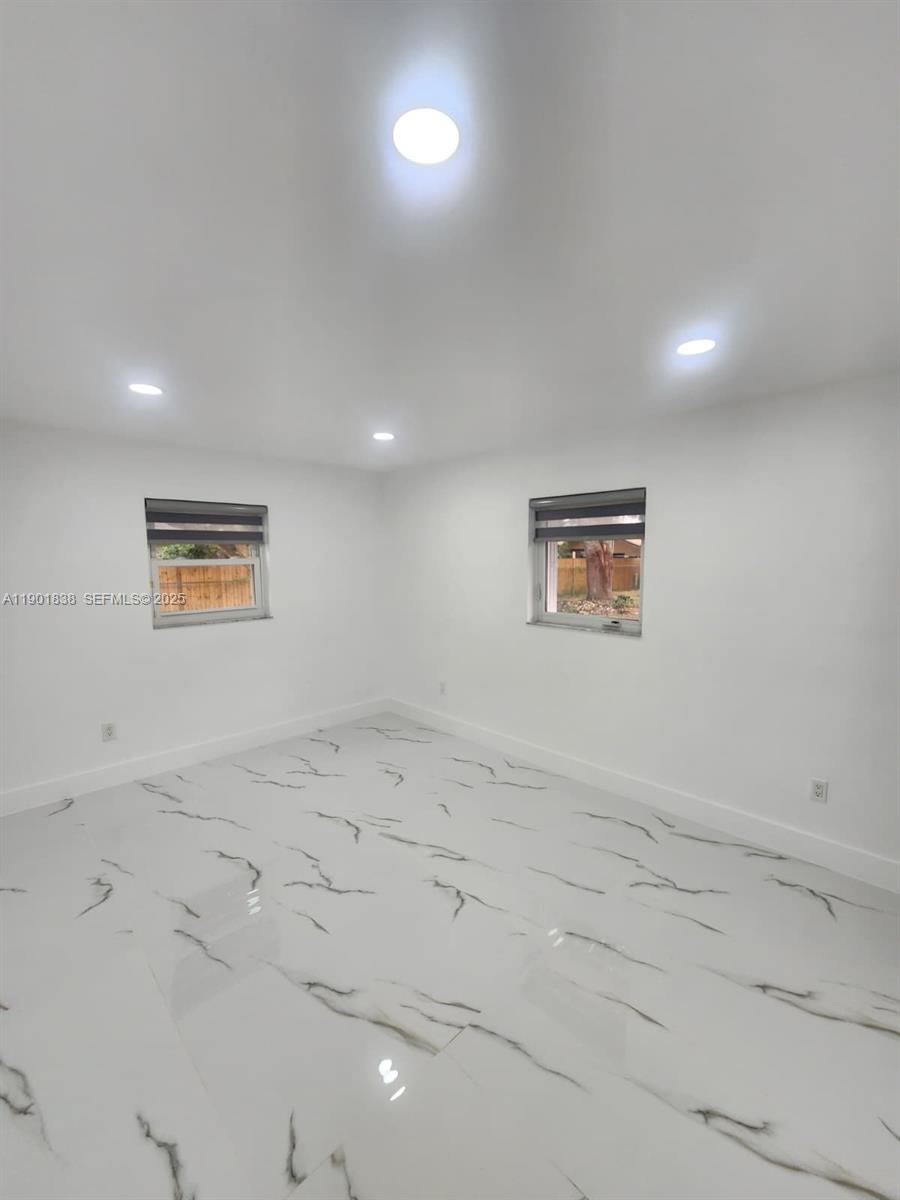 19621 Southwest 308th Street Homestead, FL 33030 - Photo 29 of 31 an empty room with a window