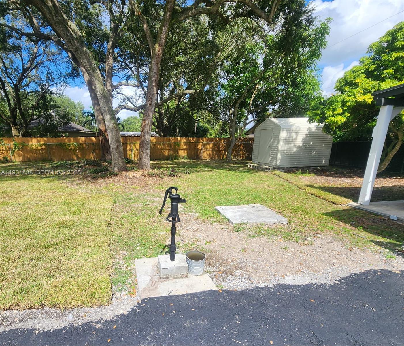 19621 Southwest 308th Street Homestead, FL 33030 - Photo 9 of 31 a fire hydrant in the middle of a yard