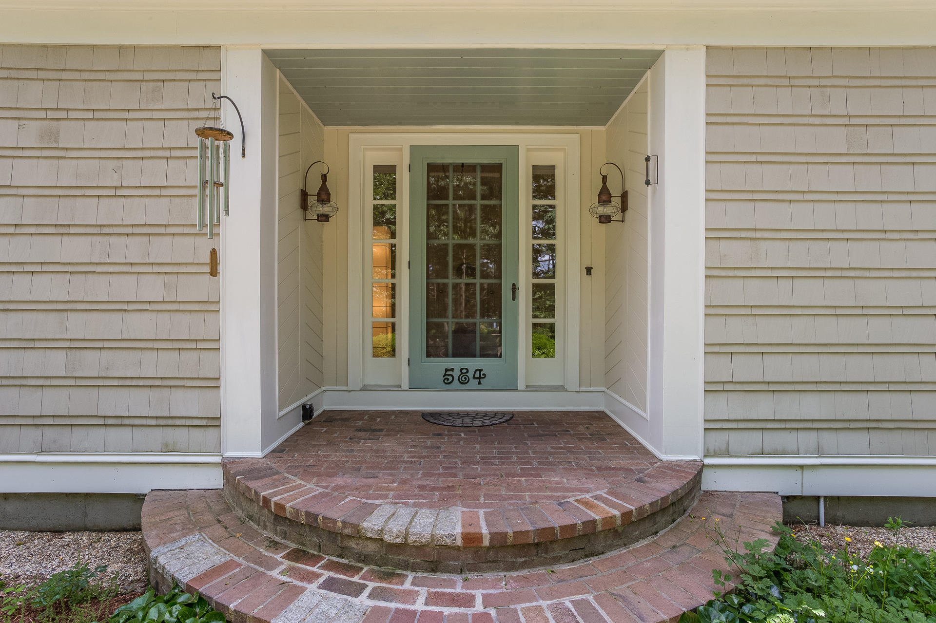 584 Delano Road Marion, MA 02738 - Photo 3 of 24 a view of a entryway door of the house