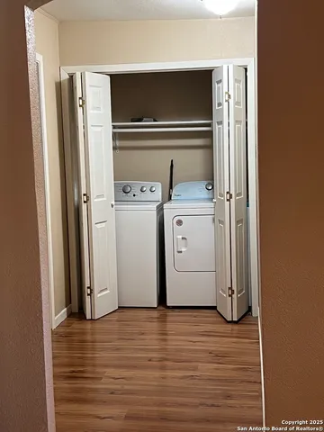 a utility room with dryer and washer