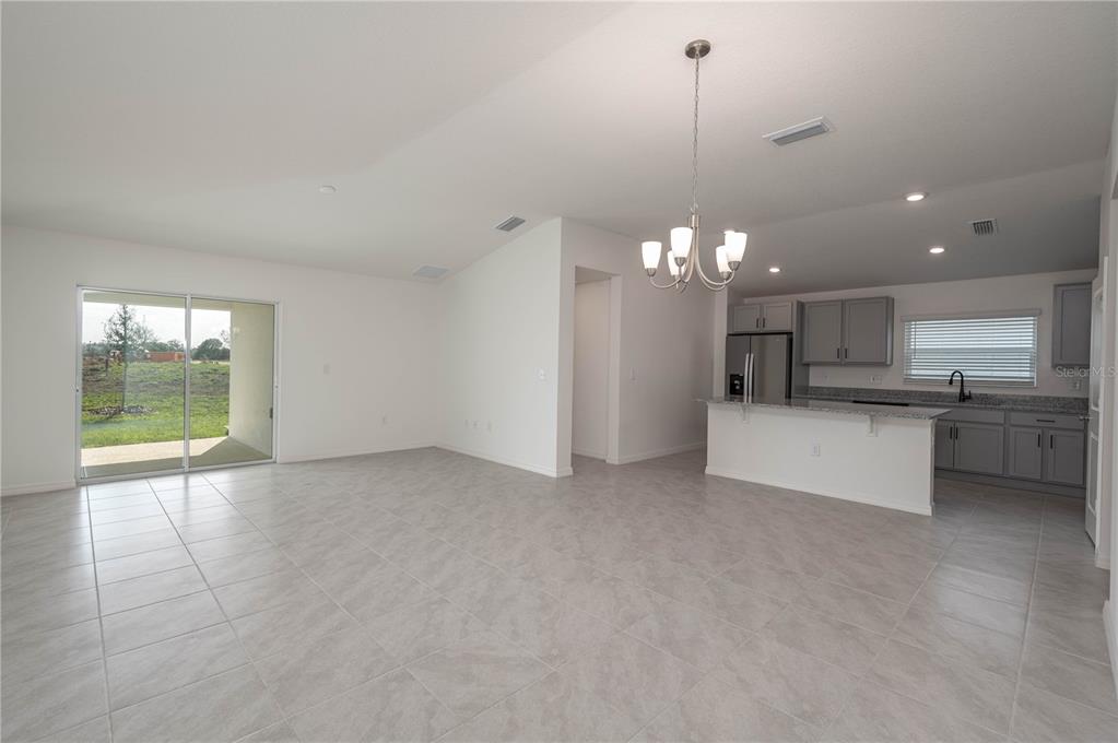 622 Meadows Edge Place Lake Wales, FL 33859 - Photo 3 of 9 a view of a kitchen with a sink and cabinets