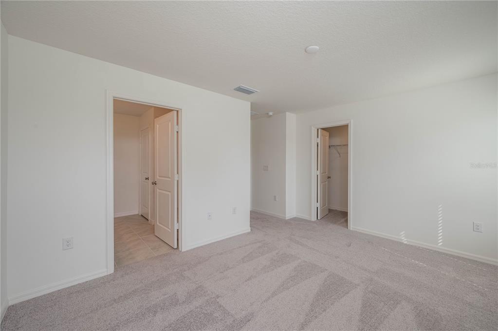 622 Meadows Edge Place Lake Wales, FL 33859 - Photo 5 of 9 a view of an empty room and closet area
