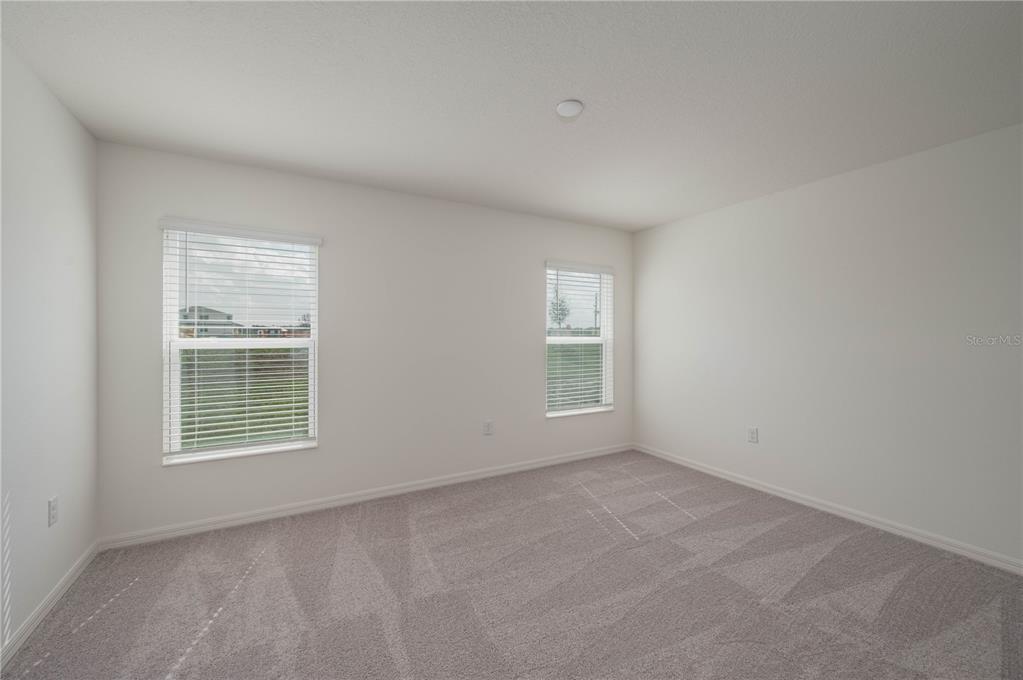 622 Meadows Edge Place Lake Wales, FL 33859 - Photo 8 of 9 an empty room with a window