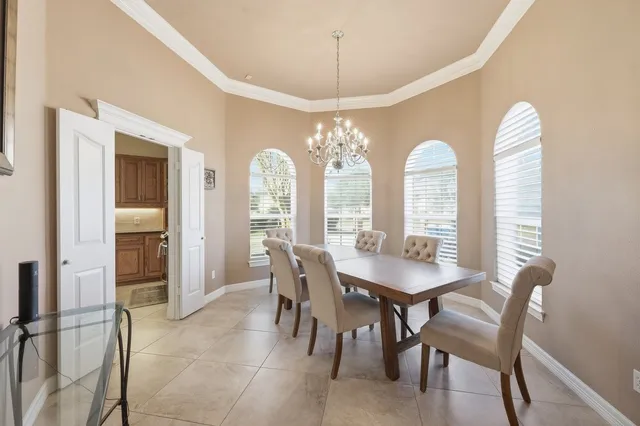 a bathroom with a toilet a sink and a mirror
