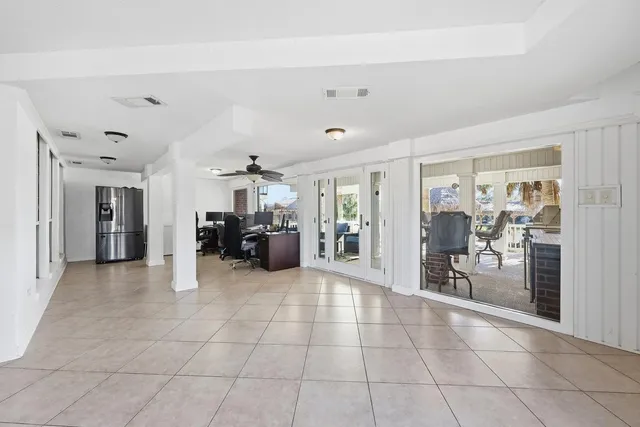 an aerial view of a house with a lake view