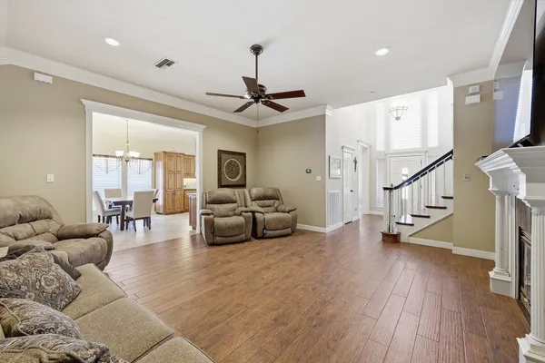 a kitchen with a table and chairs in it