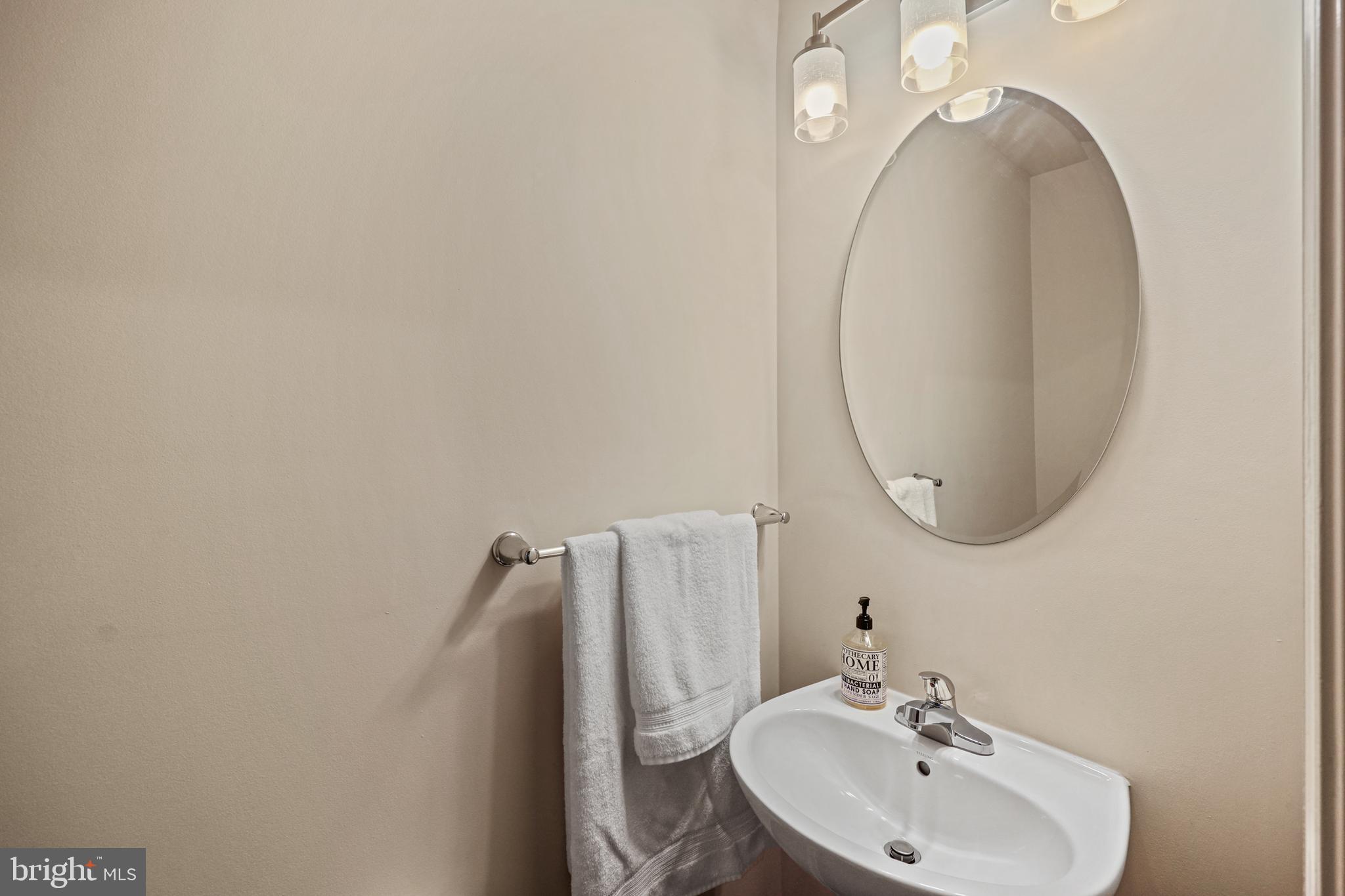 16 Azalea Circle Elkton, MD 21921 - Photo 11 of 30 a bathroom with a sink and mirror