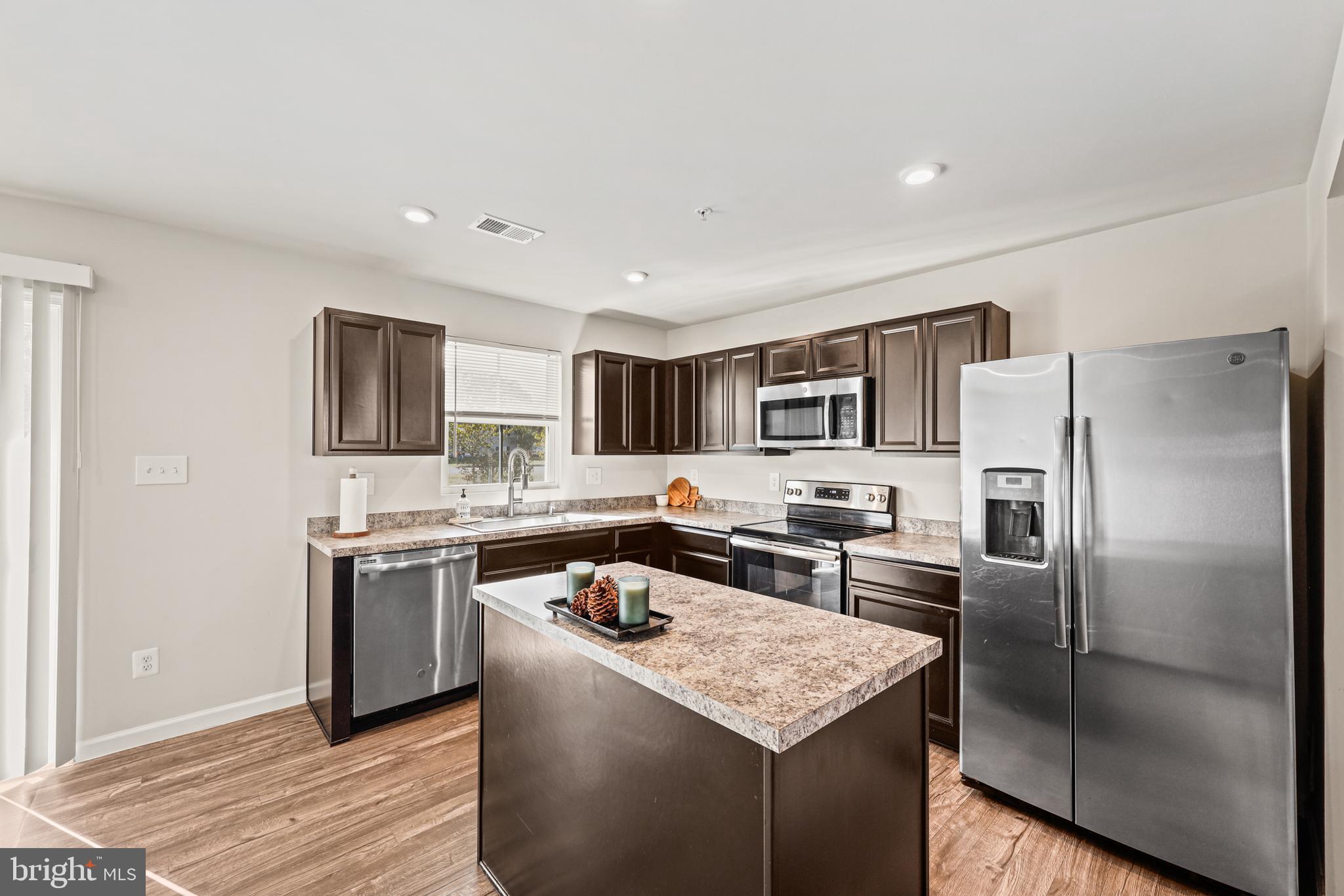 16 Azalea Circle Elkton, MD 21921 - Photo 2 of 30 a kitchen with stainless steel appliances granite countertop a refrigerator stove microwave and sink