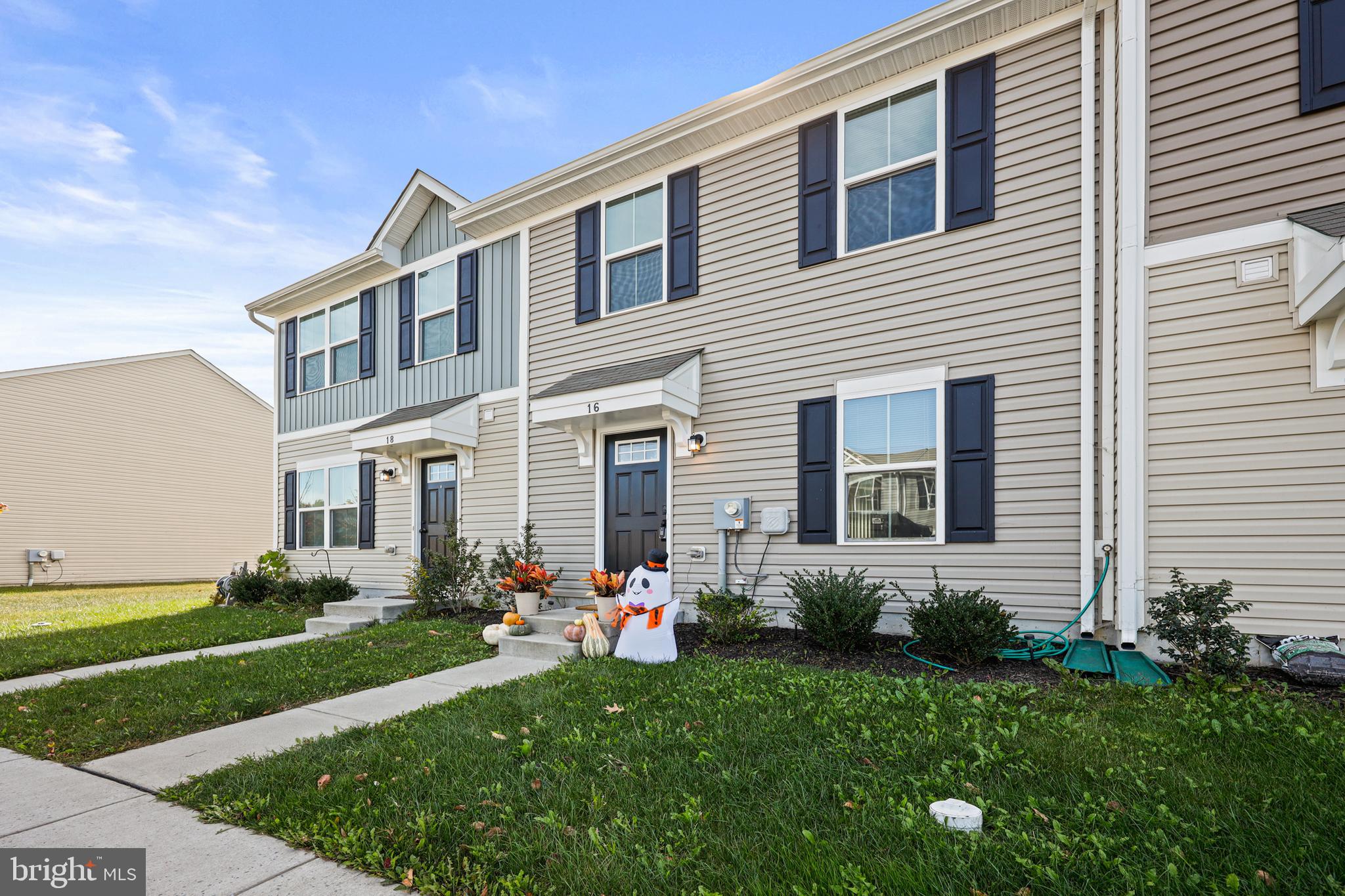 16 Azalea Circle Elkton, MD 21921 - Photo 26 of 30 a group of people sitting in front of a house