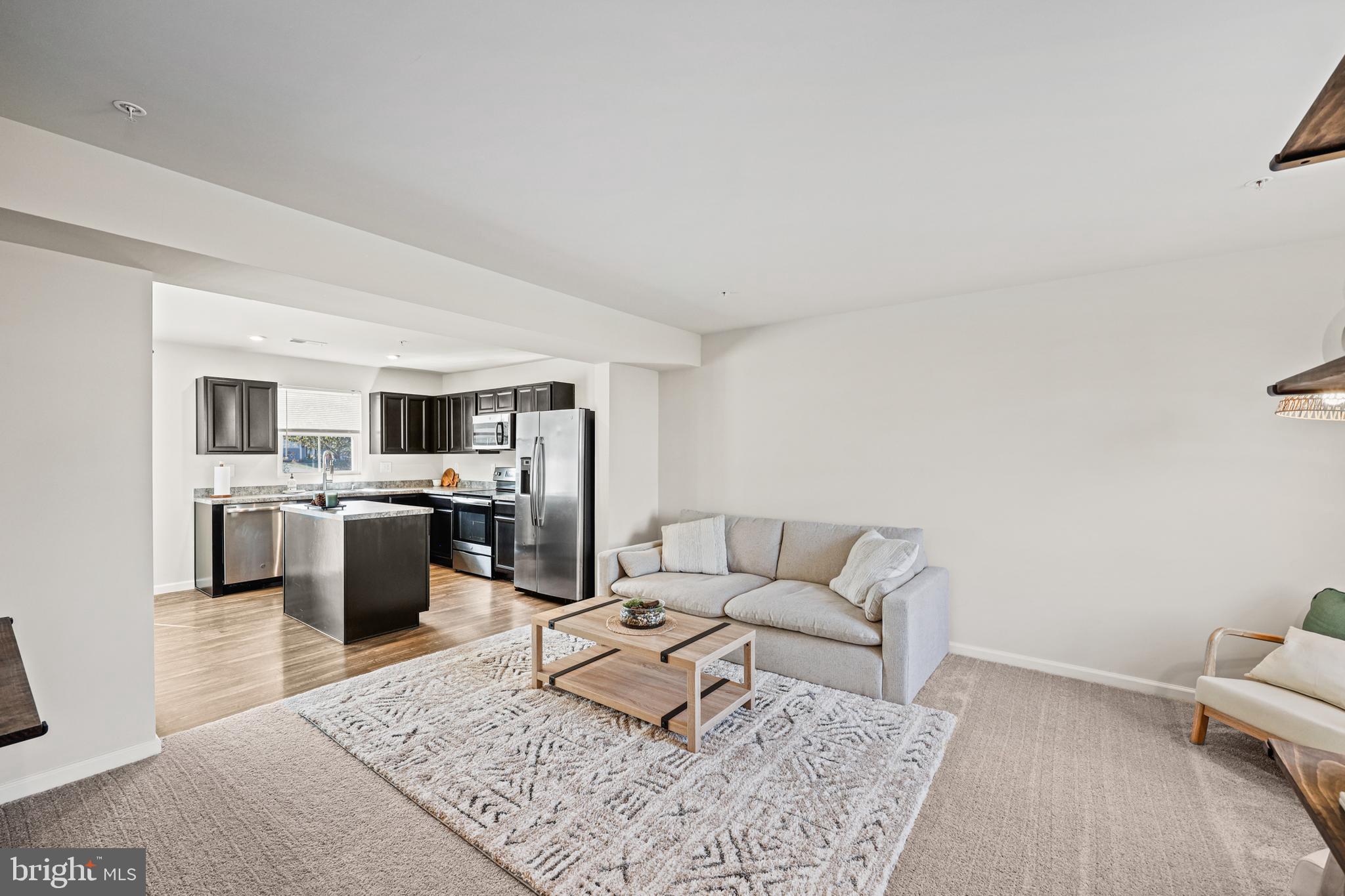 16 Azalea Circle Elkton, MD 21921 - Photo 7 of 30 a living room with furniture and view of kitchen