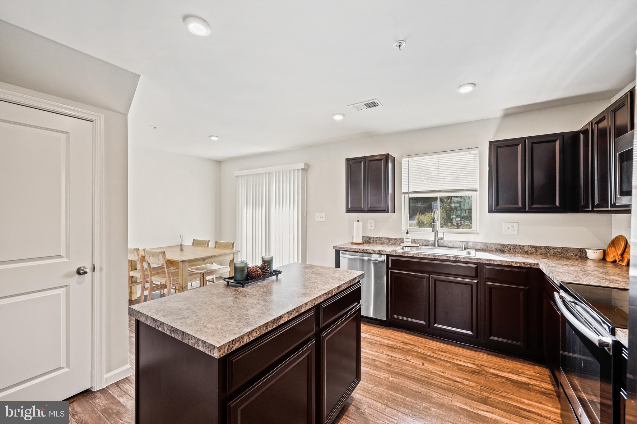 16 Azalea Circle Elkton, MD 21921 - Photo 8 of 30 a kitchen with stainless steel appliances granite countertop a sink stove and refrigerator