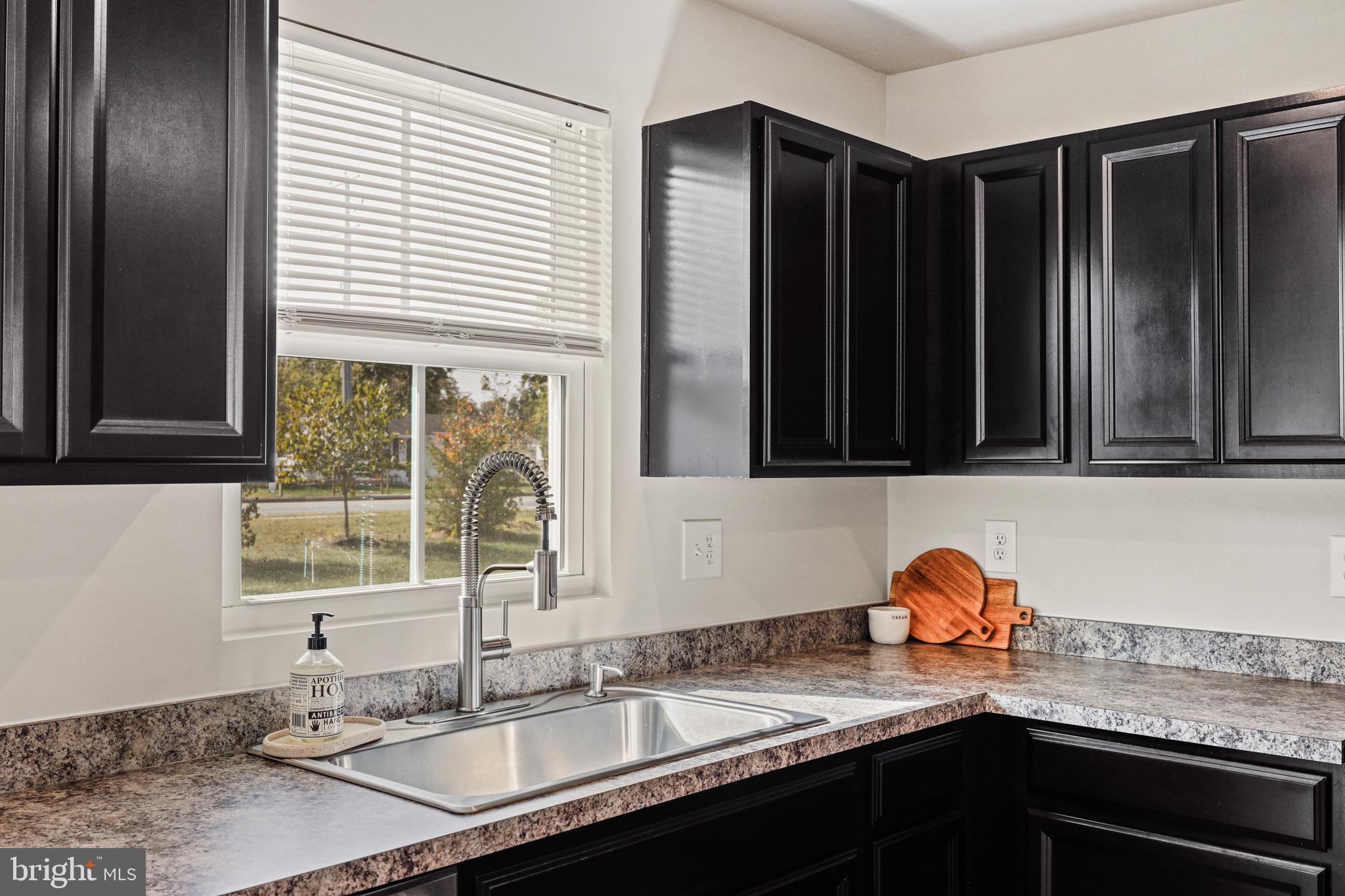 16 Azalea Circle Elkton, MD 21921 - Photo 10 of 30 a kitchen with granite countertop a sink and a window