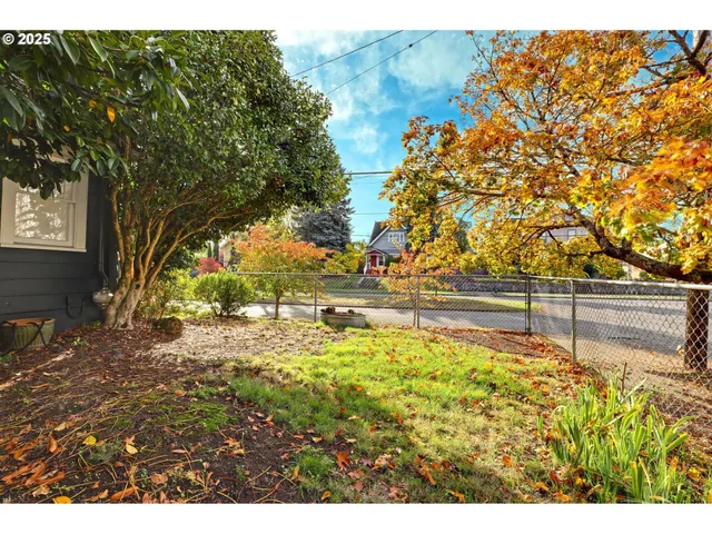 a view of a yard with an outdoor space