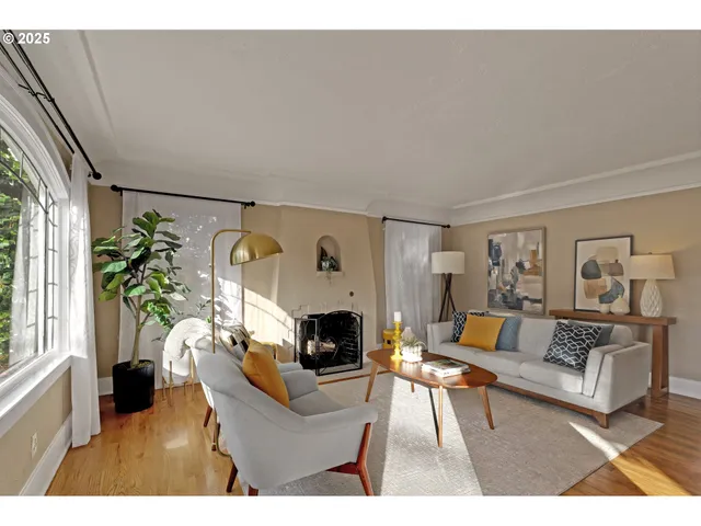 a living room with furniture and a fireplace