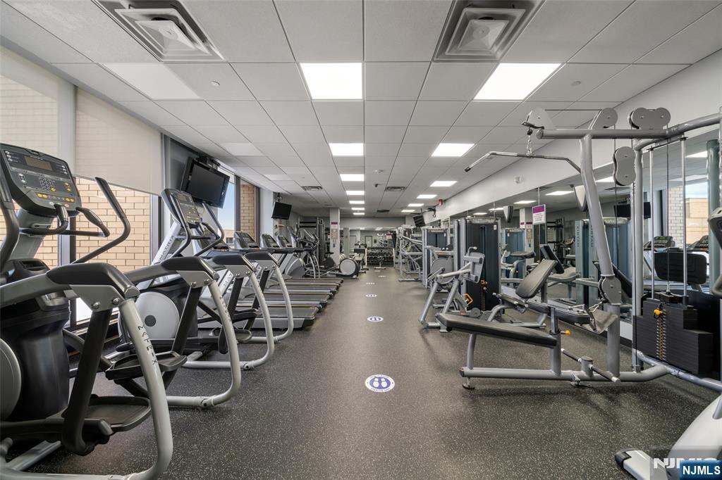 800 Palisade Avenue, Unit 1804 Fort Lee, NJ 07024 - Photo 21 of 23 a view of a room with gym equipment