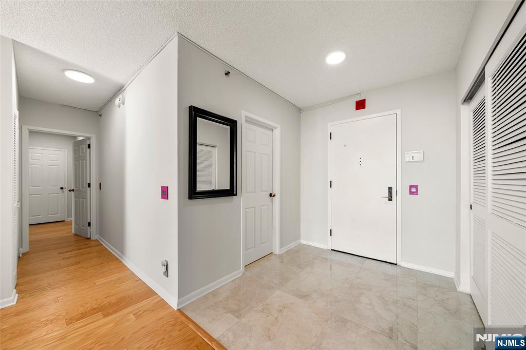 800 Palisade Avenue, Unit 1804 Fort Lee, NJ 07024 - Photo 3 of 23 a view of hallway