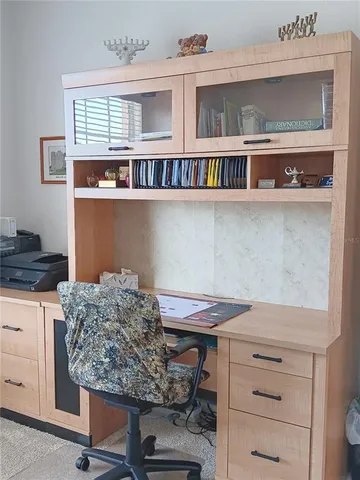 a kitchen with a cabinets and window
