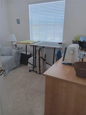 a room with furniture and window