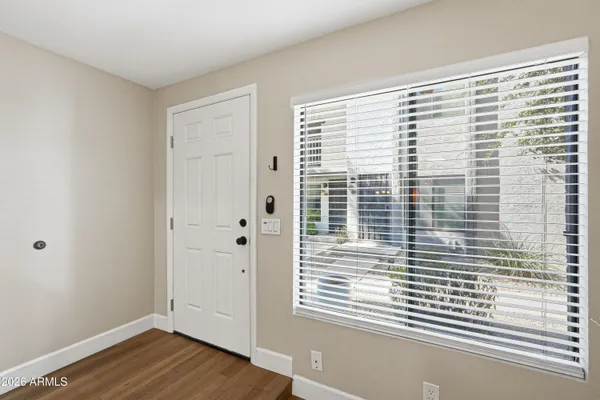 a view of a room that has a window in it