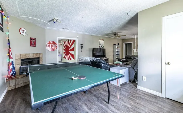 a room with furniture and a flat screen tv