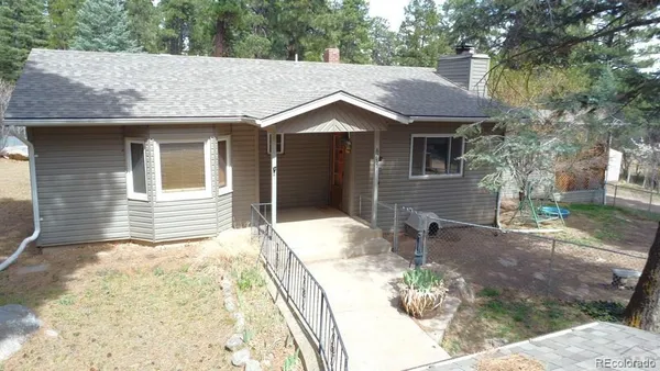 a view of livingroom with wooden floor and a outdoor space