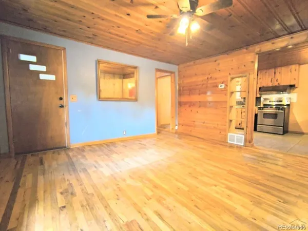 a view of an empty room with a window