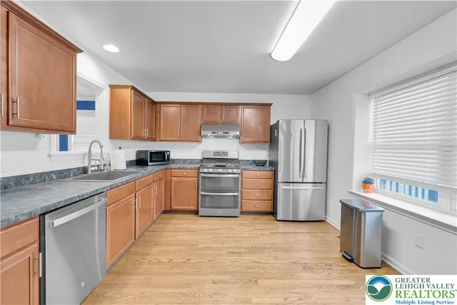 a bathroom with a toilet and a sink