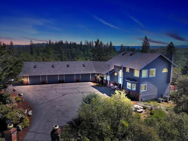 a aerial view of a house with a garden