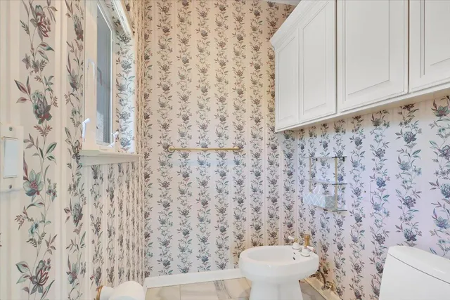 a view of a garage with furniture and a garage