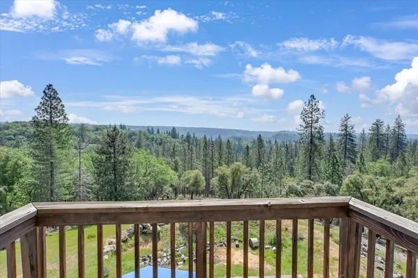 a view of a street with a houses
