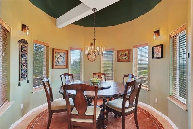 a view of a balcony with furniture
