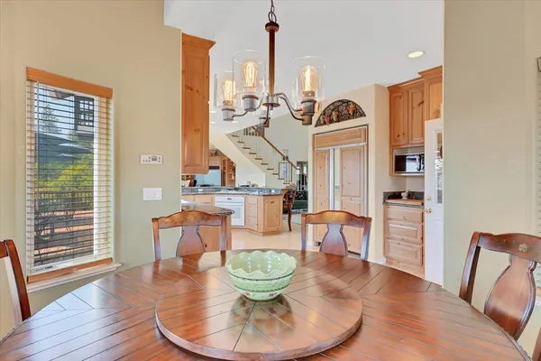 a view of a pathway with a wrought fence