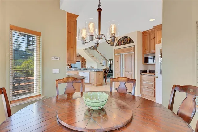 a view of a pathway with a wrought fence