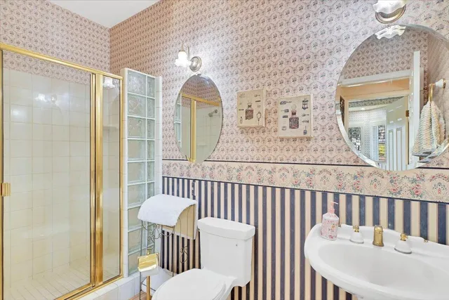 a bedroom with a workspace