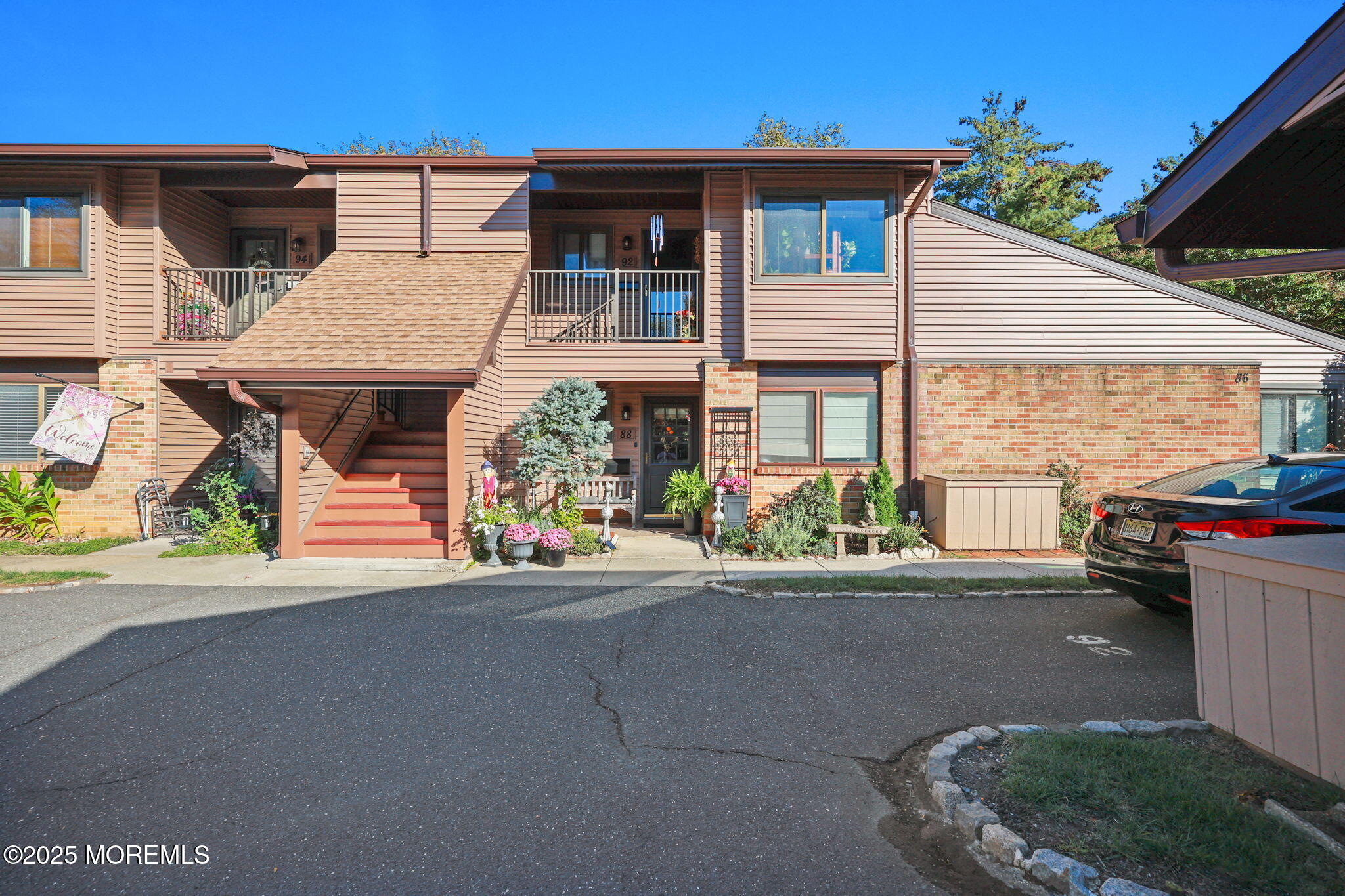 88 Friendship Court Red Bank, NJ 07701 - Photo 21 of 33 a front view of a house with a garage