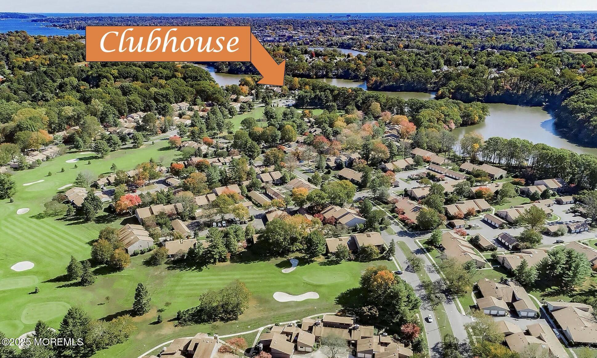 88 Friendship Court Red Bank, NJ 07701 - Photo 26 of 33 an aerial view of a house with a yard and lake view